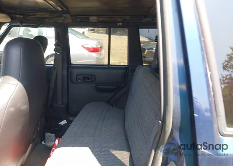 2000 Jeep Cherokee Sport from USA, damaged, VIN 1J4FF48S7YL120307